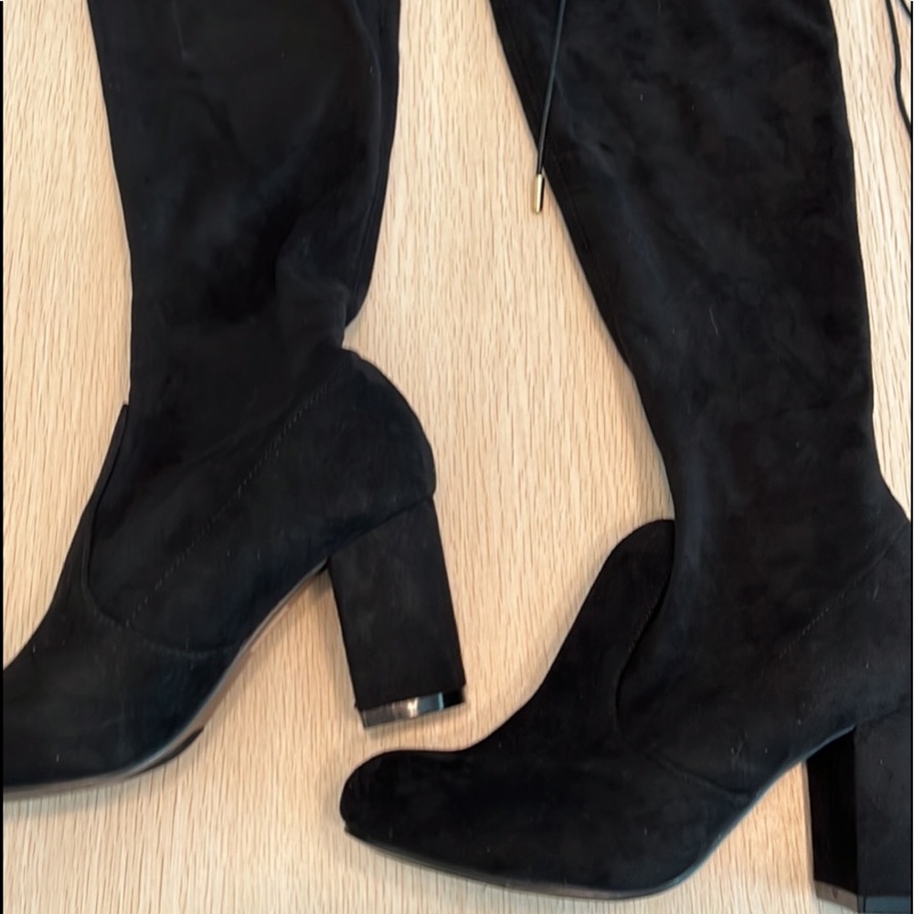Size 6 Black thigh high suede boots. Tie up the back. Worn once. Smoke free home